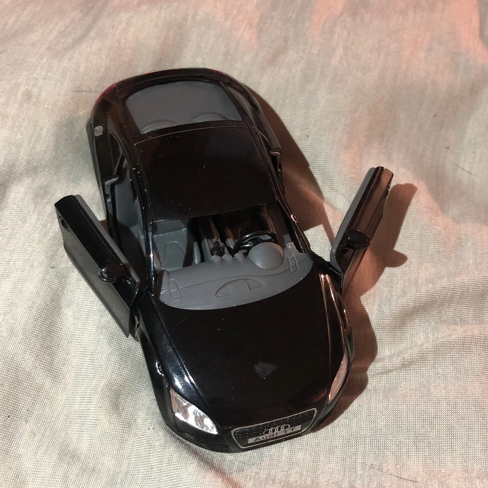 Black 2008 Audi TT pull back action